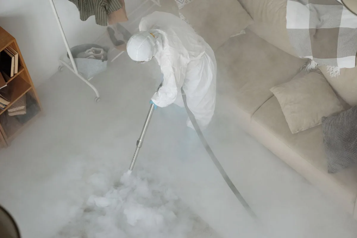 Biohazard cleanup technician in protective equipment, Parkland Estates, Tampa, FL